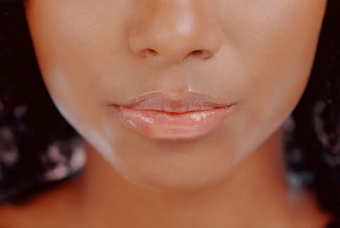 Glossy lips are gorgeous lips stock photo