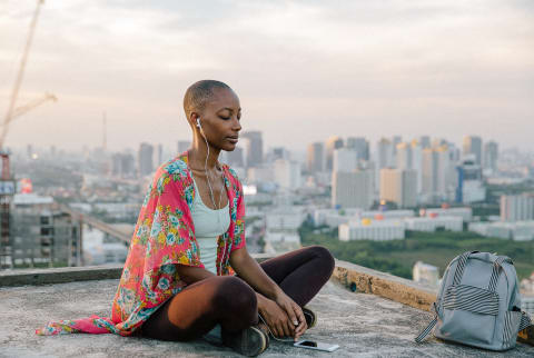 Woman Listening to Guided Meditation