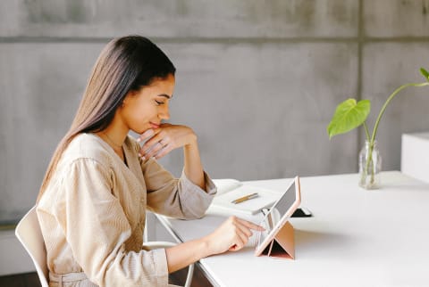 Woman working on ipad