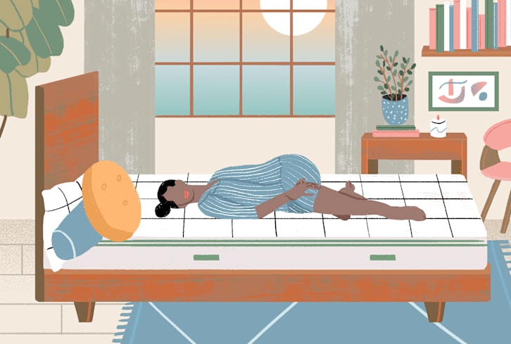The Best In-Bed Stretches For Wakeful Winter Mornings