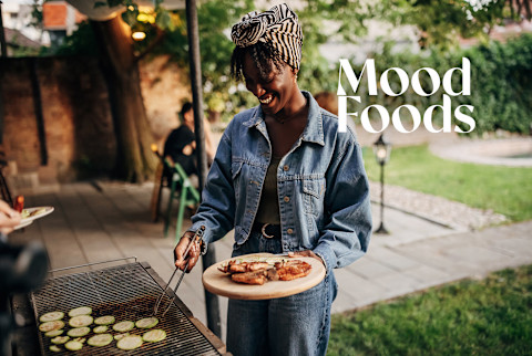 Woman barbecuing outside Woman barbecuing outside