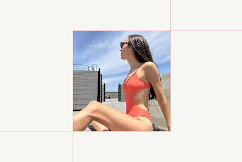photo of editor wearing cupshe bathing suit sitting on roof photo of editor wearing cupshe bathing suit sitting on roof