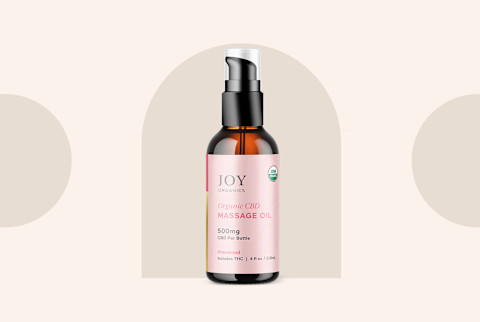 Best CBD Massage Oil Joy Organics on background Best CBD Massage Oil Joy Organics on background