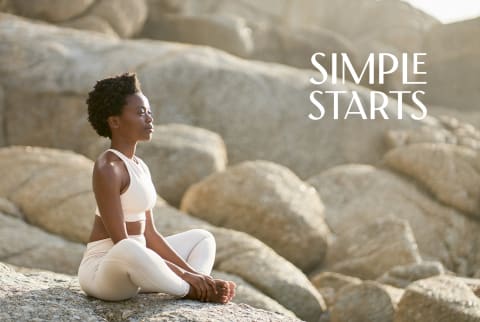 woman meditating outside 