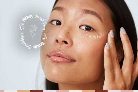 woman applying eye cream