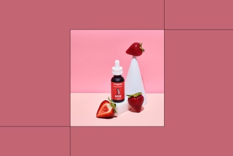 penguin strawberry cbd oil next to image of product