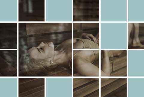 woman laying in hot sauna