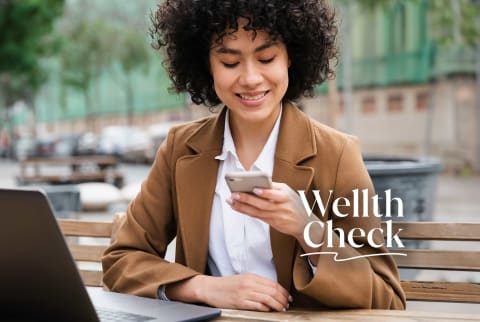 Beautiful Young Professional Woman checking on her phone