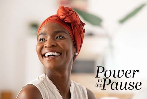 Power to the Pause: Woman in 40s smiling and looking empowered