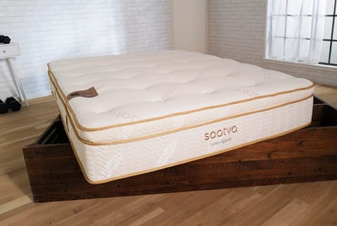 Saatva Latex Hybrid Mattress In Testing Studio with close up of label