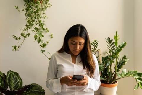 woman looking at phone