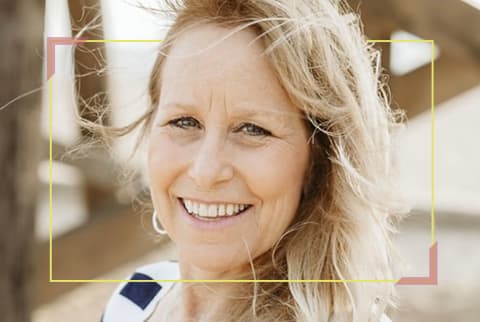 woman smiling with yellow border