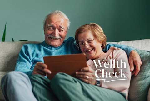 Happy retired senior couple relaxing at home