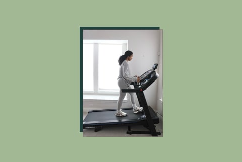 horizon treadmill main image with tester walking on horizon 7.0 treadmill with background
