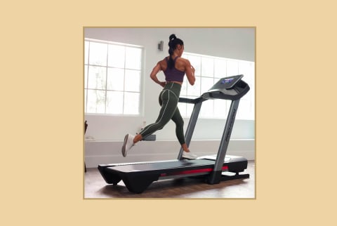 woman on treadmill on background