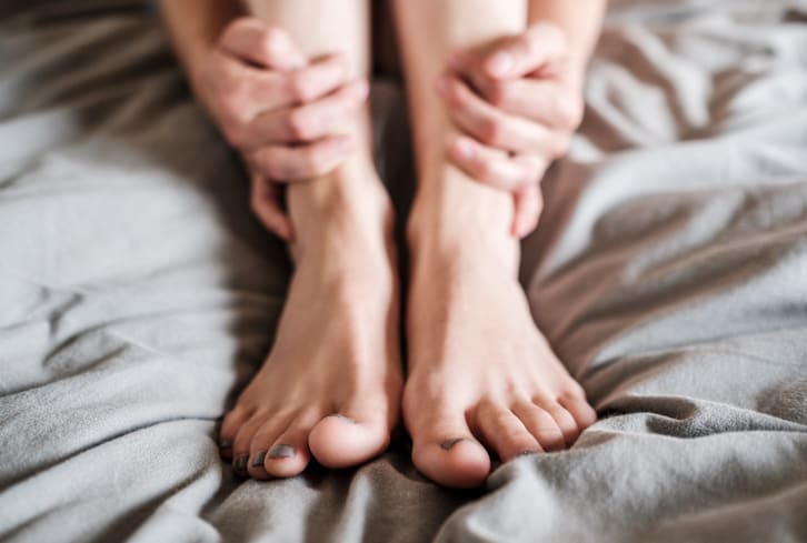 Always Have Cold Hands & Feet? Here's What It Could Mean, From An MD