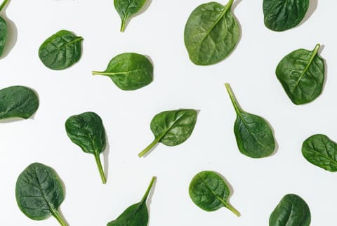 Spinach Leaves On White Background