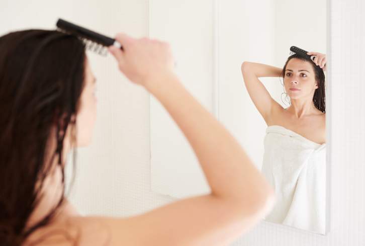 The Surprising (And Common) Mistake That Can Cause Greasy Hair