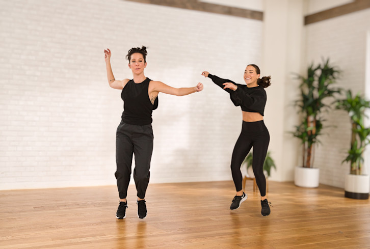 An 8-Minute Workout To Shake Off Your Stress & Dance Your Way Into 2022