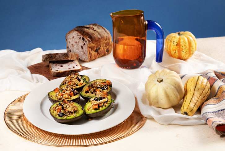 Baked Stuffed Avocados Are Our Favorite Way To Upcycle Those Thanksgiving Dinner Leftovers