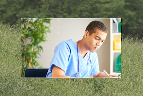 Medical student with background of green grass Medical student with background of green grass