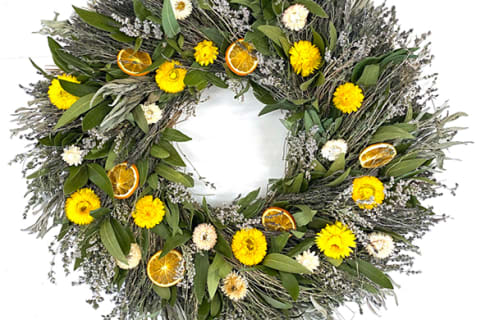 colorful wreath with lavender and dried citrus fruits