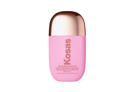 Kosas DreamBeam SPF in goldenglow hue with pink bottle on white background