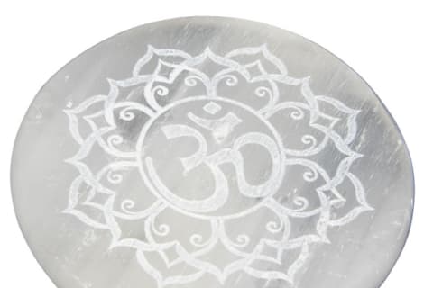 selenite crystal round with om symbol