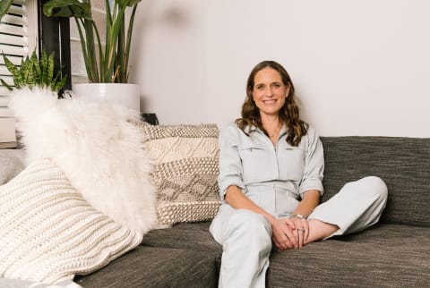 Colleen sitting on couch