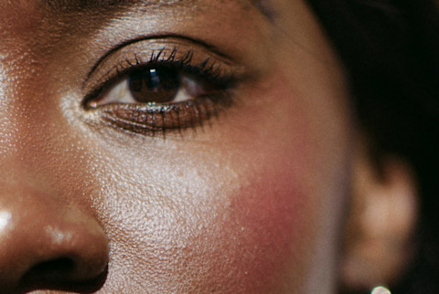 (Last Used: 2/8/21) Woman with smooth skin and pink blush (Last Used: 2/8/21) Woman with smooth skin and pink blush