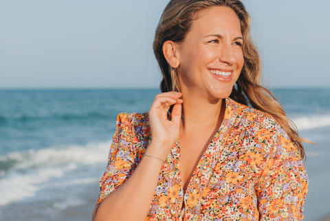 Talia Pollock Smiling on a Beach