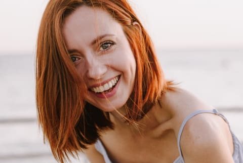 Woman in her 30s smiling