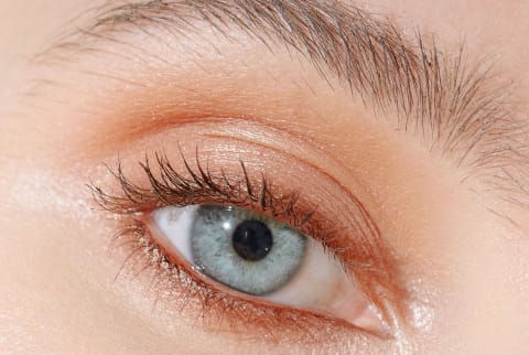 Closeup Shot of a Blue Eye with Soft Makeup