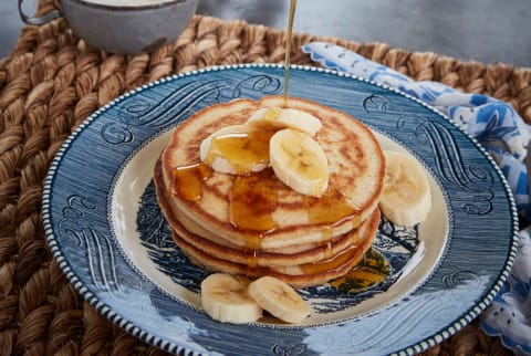 Protein pancakes with bananas and syrup