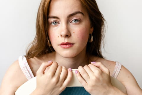 Portrait Of A Young Woman With Natural Makeup