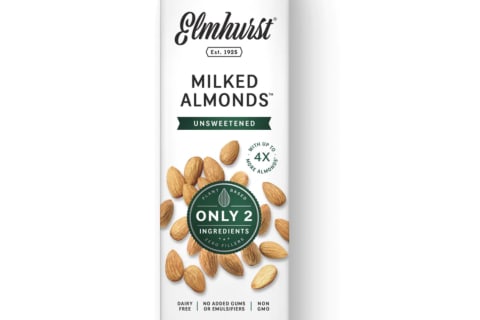Almond milk in white container with green details