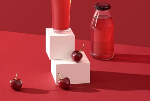 A Glass Of Cherry Juice And Cherry Fruit