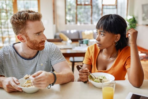 Tense Couple Eating Breakfast Together