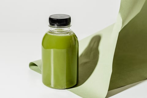 Bottle of Green Juice on a Seamless