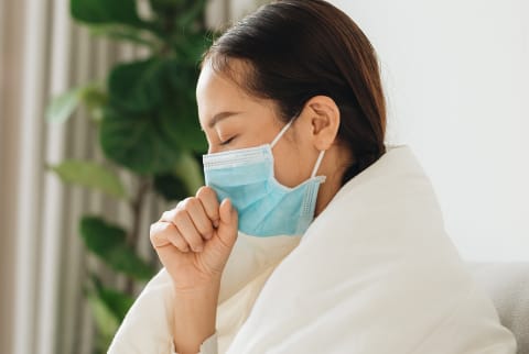 Respiratory Droplets Can Still Spread When You Cough Wearing A Mask, New Study Finds