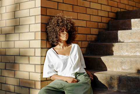 Upset Young Woman Sitting Outside Upset Young Woman Sitting Outside