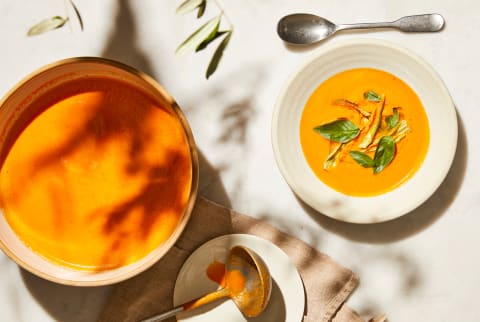 Tomato soup and laddle with spoon