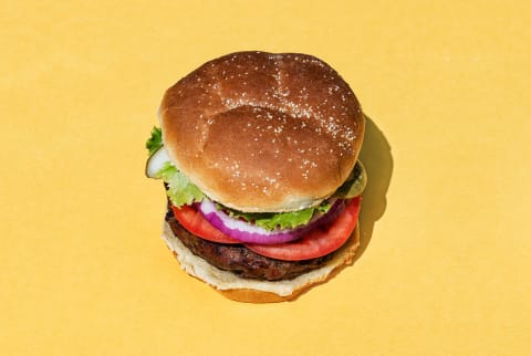 Burger on yellow background