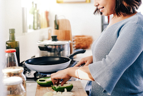 Woman Cooking at Home Woman Cooking at Home