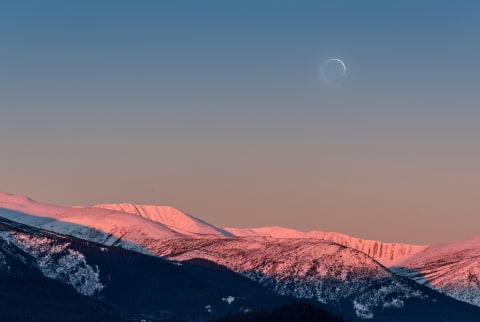 new moon mountains and sky