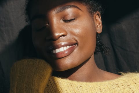 Young black woman in the sun