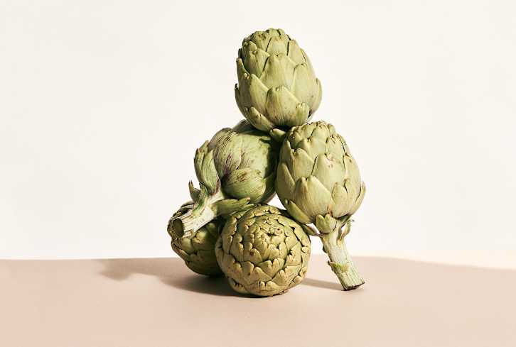 The Healthiest Ways RDs Eat Canned Artichokes, From Pizzas To Salad