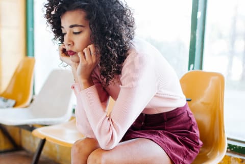 Tired Woman Sitting Down