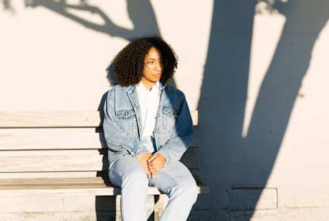 woman sitting outside woman sitting outside