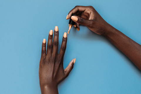 Woman Painting Her Nails